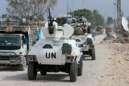 French peacekeepers with the United Nations Interim Force in Lebanon cross the Qasmiyeh Bridge towards Sidon and Beirut