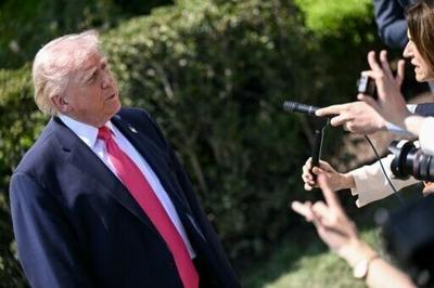 US President Donald Trump speaks to reporters before walking to board Marine One as he departs from the South Lawn of the White House
