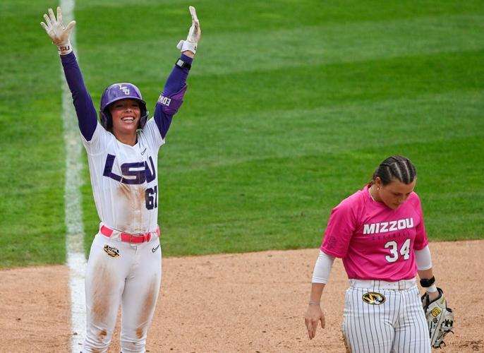 LSU infielder Kylee Edwards celebrates on third base