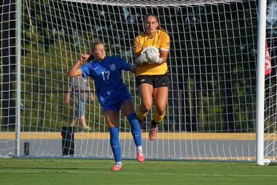 Mizzou goalkeeper Kate Phillips (1) makes a save