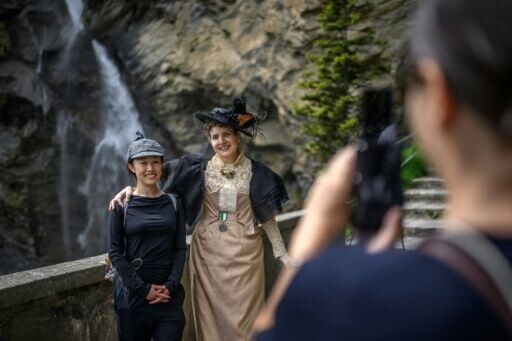 Sherlock fanatic and Chinese visitor Kitty (L) could not believe it when she walked into the group's re-enactment