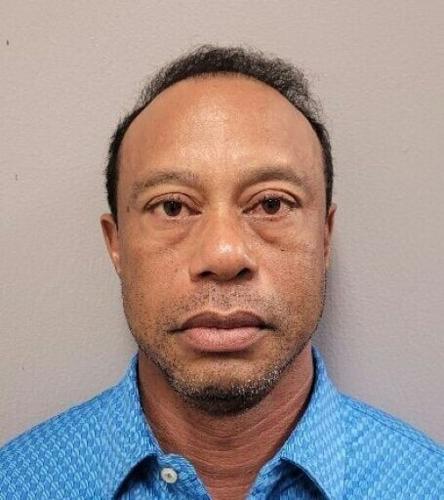 This handout booking photo shows golf superstar Tiger Woods after his arrest on suspicion of driving under the influence after a car crash in Florida