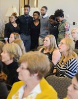 Concerned Student 1950 supporters listen as students voice their concerns