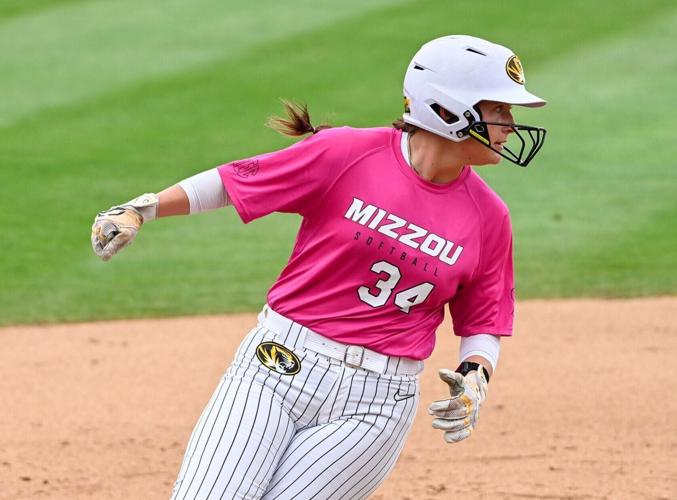 Mizzou third baseman Addy Waits runs past third base