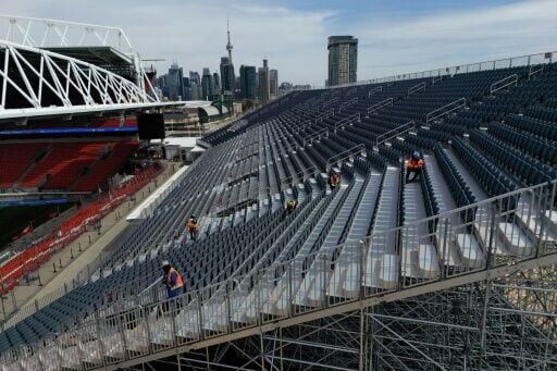 Workers are seen assembling temporary seating to expand capacity at BMO Field in Toronto, Canada ahead of the 2026 World Cup