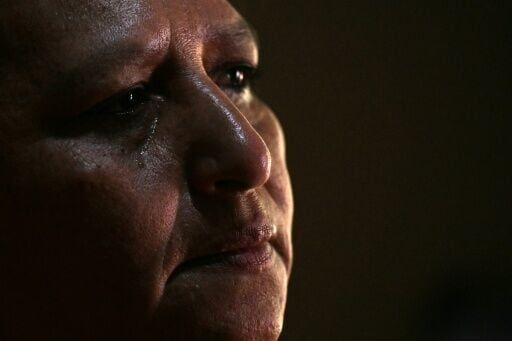 Gladis Villatoro, 55, fears her son will be made to pay for the crimes of others in one of several mass trials denounced by rights groups