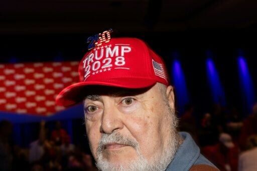 A man wears a hat reading 'Trump 2028' during the Conservative Political Action Conference (CPAC) in Grapevine, Texas, on March 26, 2026