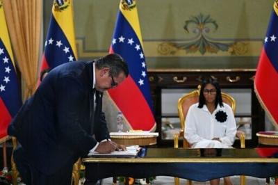 Chevron Venezuela Mariano Vela signed the deals next to Venezuela's interim President Delcy Rodriguez during a ceremony at the Miraflores Palace in Caracas