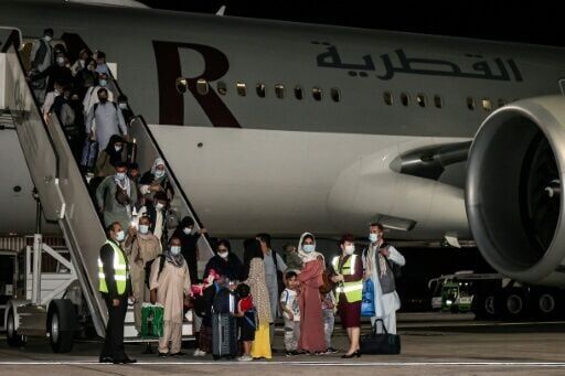After the US withdrawal in 2021, evacuees from Afghanistan fled to escape the Taliban, seen here landing at Hamad International Airport in Qatar's capital Doha from Kabul