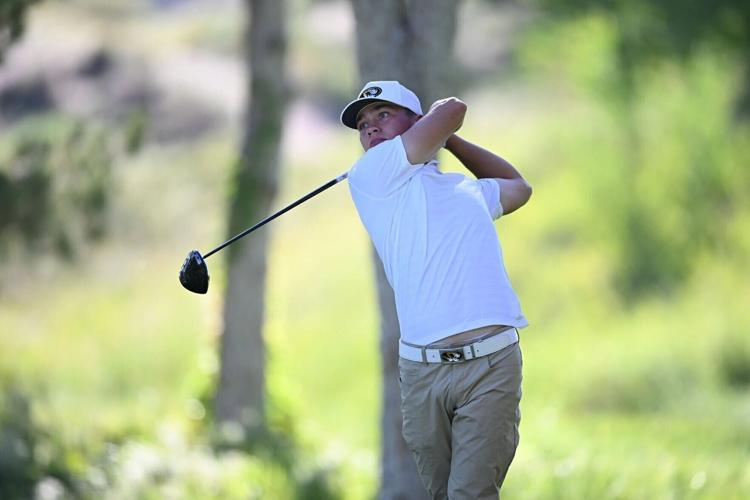Antoni Hawkins follows through on a swing
