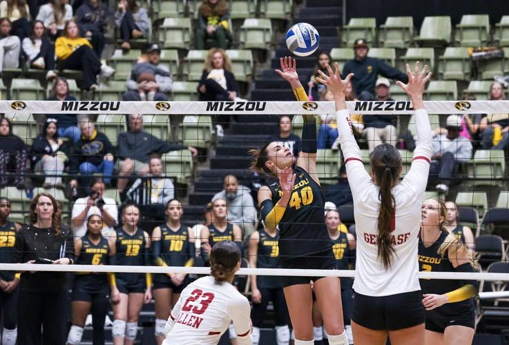 Mizzou senior Grace O’Reilly (40) returns the ball