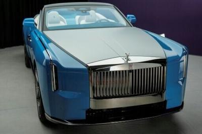 Rolls-Royce has unveiled its new luxury electric vehicle, limited to just a 100 cars at the company's Goodwood plant in Chichester, south of London