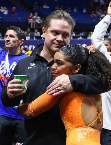 Florida’s Owen Field and eMajae Frazier embrace