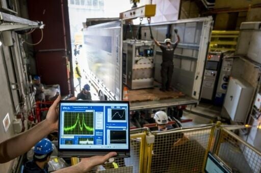 The frequency antiprotons vibrate at takes an M shape with two peaks, but had they merged into one, it would have meant they had annihilated