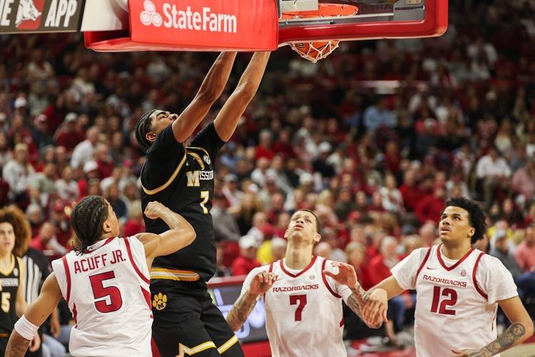 From left, Arkansas guard Darius Acuff Jr. (5), Arkansas forward Trevon Brazile (7) and Arkansas forward Malique Ewin (12) (copy)