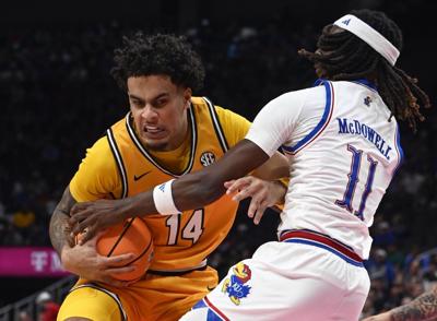 Missouri Forward Jevon Porter (14) battles against Kansas (copy)