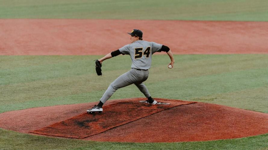Josh McDevitt pitches in the series opener