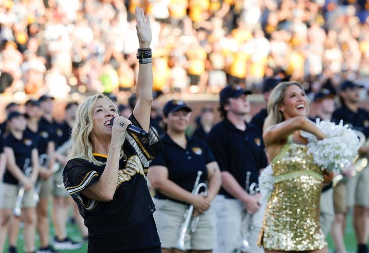 Sheryl Crow sings the national anthem ahead of kickoff