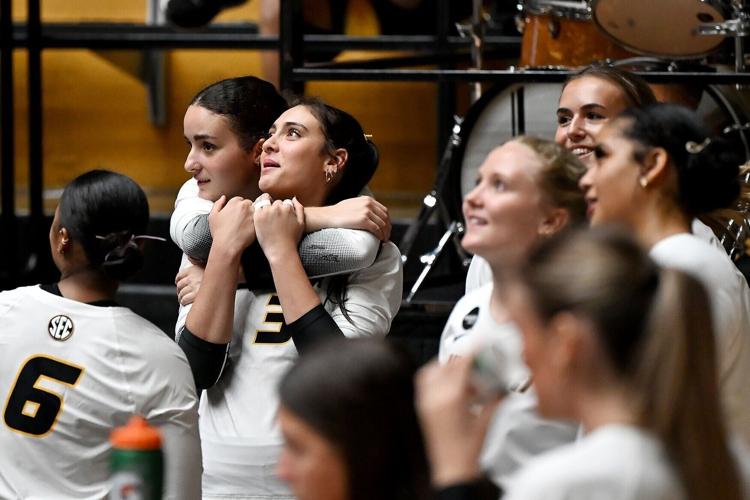 Mizzou sophomore opposite hitter Maca Lobaglio (10) and freshman outside hitter Maizy Agnello (3) wait for a play to be reviewed