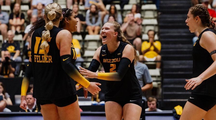 Sierra Dudley (2) celebrates with other members