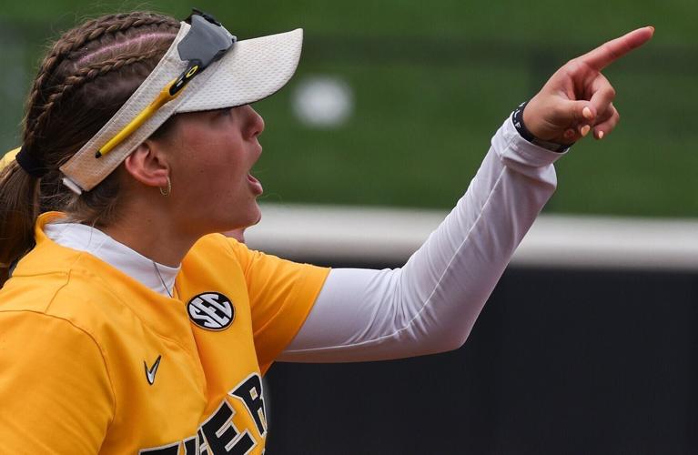 Avery Porter (12) shouts at Mizzou softball’s game against