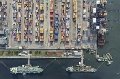 Cargo ships at the container terminal of Tanjung Priok Port, Jakarta, on March 31, 2026