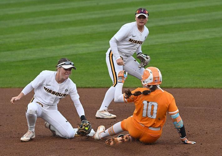 Mizzou infielder Sophie Smith (22) tags out Tennessee outfielder Alannah Leach