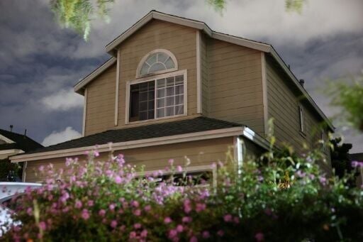 FBI agents were seen preparing to enter a gabled two-story residence in Torrance, California linked to the suspect