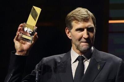 German basketball player Dirk Nowitzki was inducted into the FIBA Hall of Fame in Berlin on Tuesday.