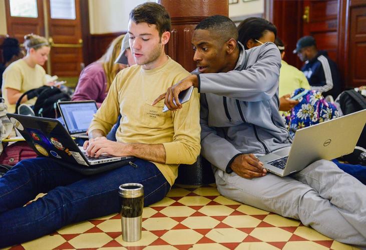 Matt McKeown, left, talks with Cortez Brown