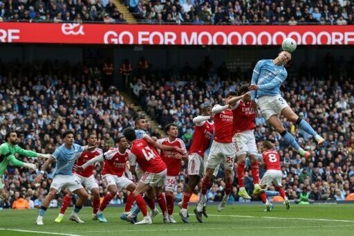 Manchester City beat Arsenal 2-1 to take control of the Premier League title race