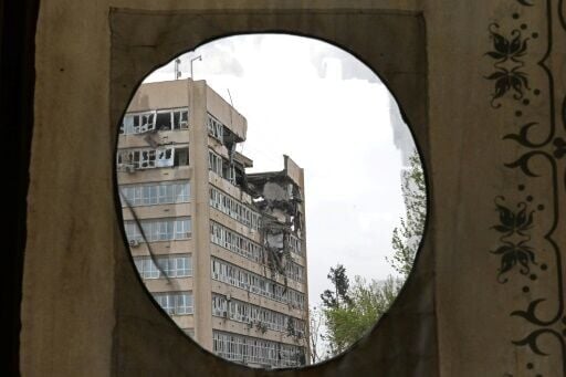 A view of a building damaged by strikes in Tehran on April 4, 2026