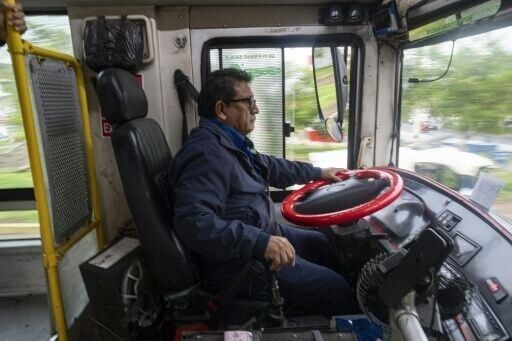 Bus drivers like Zacarias Lopez Bujaico face threats of extortion and death from gangsters in Peru's capital, Lima