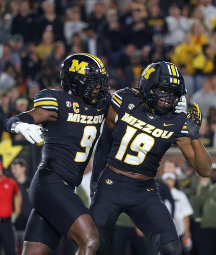 Mizzou defensive end Zion Young (9) and Missouri defensive end (copy)