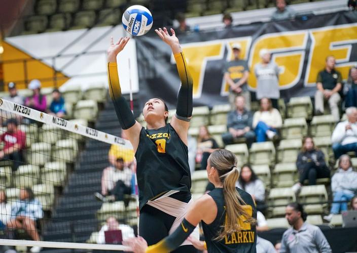 Mizzou junior Nina Mandovic (0) sets the ball during warmups