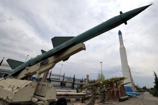 Mockups of Iranian-made missiles are displayed at an exhibition outside the Defence Museum in Tehran