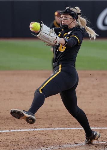 Marissa McCann (10) delivers a pitch against Minnesota (copy)