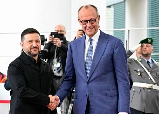 German Chancellor Friedrich Merz greets Ukrainian President Volodymyr Zelensky in Berlin