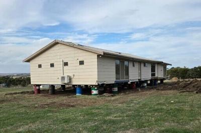 Melanie and David Moor had to move their house after discovering it was placed on the wrong plot