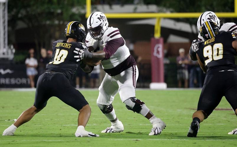 Mizzou defensive end Daeden Hopkins (10) goes up against a Mississippi State’s Jakheem Shumpert-Perkins (55) (copy)