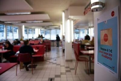 Diners have lunch at a university restaurant in France, where students get one-euro meals