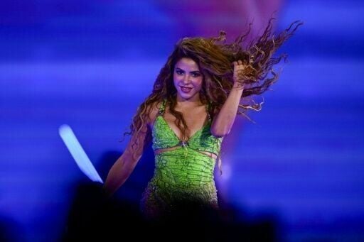 Colombian singer Shakira performs for adoring fans on Copacabana beach in Rio de Janeiro