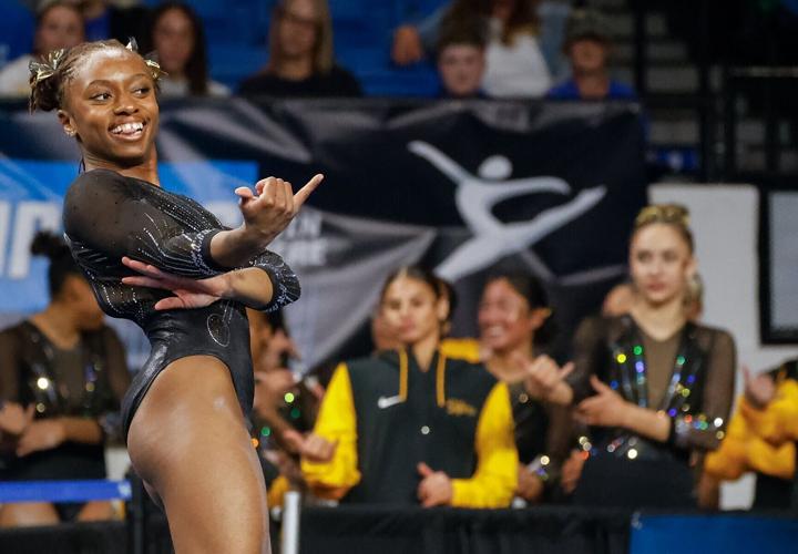 Hannah Horton strikes a pose during her floor routine at the NCAA Lexington Regional