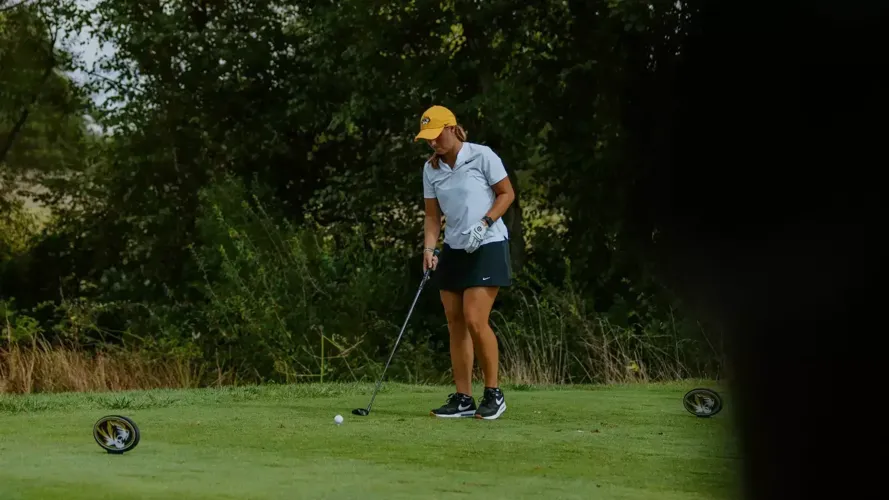 Melanie Walker approaches her ball during the "Mo" Morial