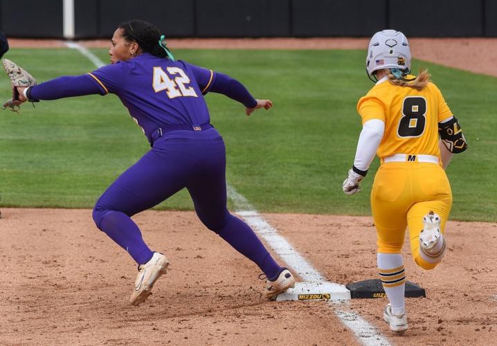Claire Calahan (8) runs to first base