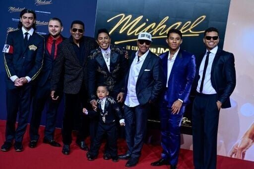 Family members including (L-R) son of Michael Jackson Bigi Jackson, son of Michael Jackson Prince Jackson, US singer Jackie Jackson, US singer Jermaine Jackson, US singer Marlon Jackson pose for photogaphers at the premiere