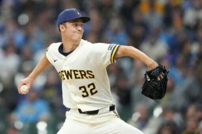 Milwaukee pitcher Jacob Misiorowski struck out 11 to set a team record in a Major League Baseball season-opening victory over the visiting Chicago White Sox