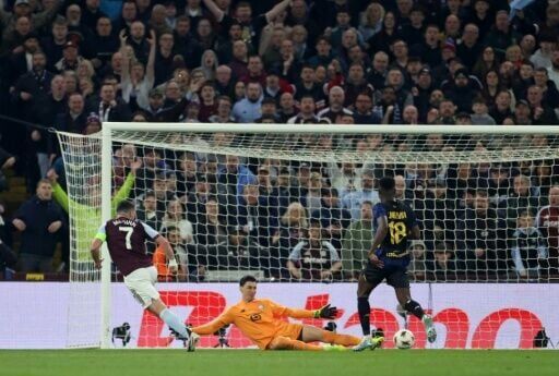 Aston Villa captain John McGinn (L) said his side "want more now" after they booked their third-consecutive last-eight spot in European competition
