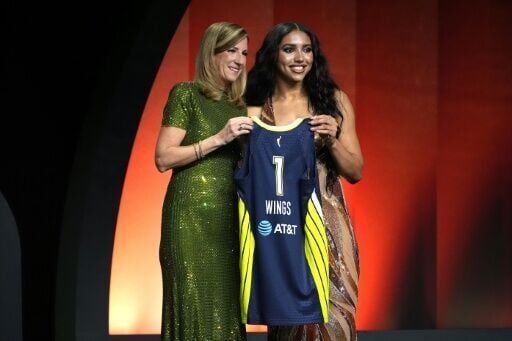 Azzi Fudd (right) poses with WNBA Commissioner Cathy Engelbert after being selected by the Dallas Wings with the 1st pick in the WNBA draft