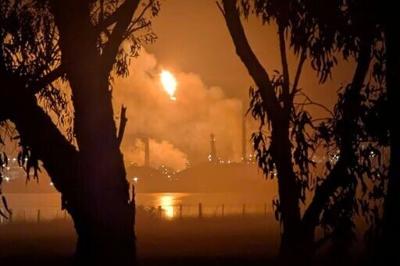 This handout photo taken and released by Giuliana Elakis on April 16, 2026 shows a fire at the Viva Oil Refinery in Geelong